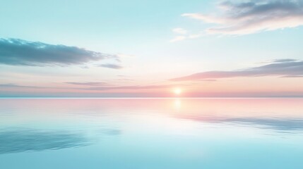 Fototapeta premium A pastel sunset over a still lake.