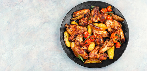 Dish of spicy chicken wings.