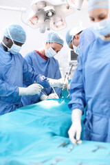 Surgery, teamwork and doctors in theater with tools in emergency medical treatment at hospital....