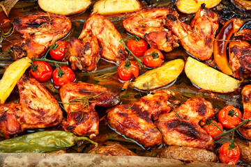 Barbecue chicken wings with sage.