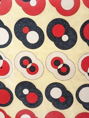 A creative display of colorful round patterns, showcasing vibrant designs and artistic concepts for modern decoration and textile inspiration.