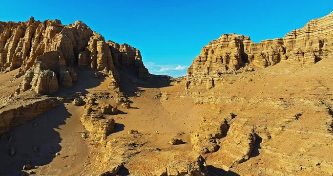 Spectacular Yardang landform mountain natural landscape in Xinjiang. A famous no man's land geopark. Dahaidao desert gobi scenery in China.