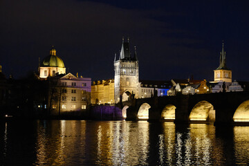 Vltava river and Charles bridge in Prague at night