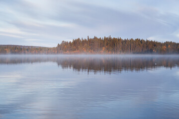 Autumnal lake scenery in Sweden during sunset