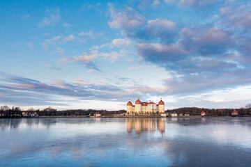 Fototapeta premium Moritzburg Castle in winter during sunrise