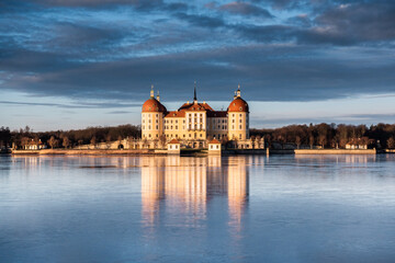 Fototapeta premium Moritzburg Castle in winter during sunrise