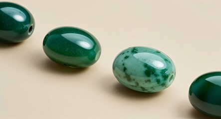 Oval jade soft green hue polished finish on a light cream background