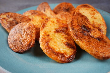 Barbecue grilled spiced potatoes  on a plate