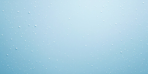 A plain light blue background with scattered white dots