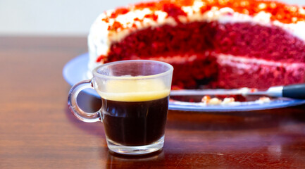 Traditional and delicious red velvet cake isolated on blue plate