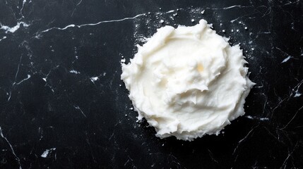 Creamy Whipped Substance on Dark Marble Surface with Powdered Texture Creating an Artistic Culinary Background for Food Photography and Recipes
