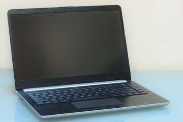 hands of a man working on laptop, typing on the keyboard, working on a notebook, screen of a mobile computer