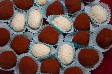 Valentines Day candy. Luxury chocolate truffle background. Chocolate praline. Bonbon truffle. Luxury handmade bonbon. Chocolate candy. Homemade chocolate candy sweet. Yummy Valentines day