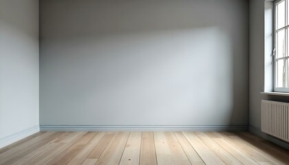 Empty room with gray walls and wooden floor
