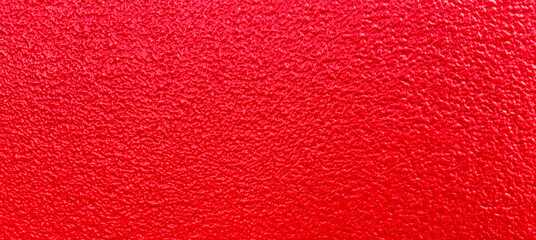 Red wall texture background.The stone wall surface painted with enamel paint.