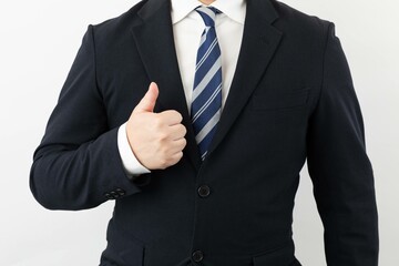 スーツ姿のビジネスマンポーズ いいね