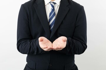 スーツ姿のビジネスマンポーズ ちょうだい