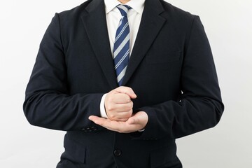 スーツ姿のビジネスマンポーズ 納得