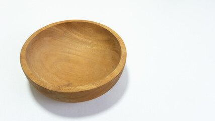 Wooden bowl isolated on white background with a 45 degree angle setup