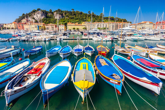 NICE, FRANCE - AUGUST 29, 2019: colorful &ldquo;pointu&rdquo; traditional wooden boats in "Port Lympia", moored in plaisance yachting marina, French Riviera of Mediterranean Sea