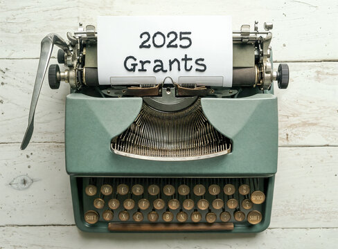 vintage typewriter with 2025 grants announcement