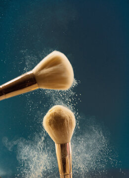 Make up brushes with makeup powder dust