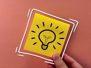 suggest an idea. an icon and a light bulb with the meaning of a new idea. business solutions.