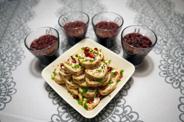 pororullat is Finnish It usually refers to a traditional Finnish dish or appetizer made with reindeer meat, often thinly sliced and rolled around fillings like cream cheese, vegetables, or herbs.
