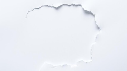 A small, jagged hole in a torn paper with rough edges, paper tear, tear
