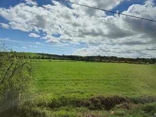 Highland Landscape with Cumulus Clouds and Power Lines © Studio-M