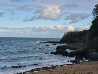 Azure Beach Landscape with Watercourse and Horizon