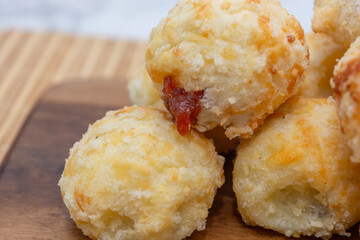 Delicious Brazilian cheese bread stuffed with sweet goiabada filling.