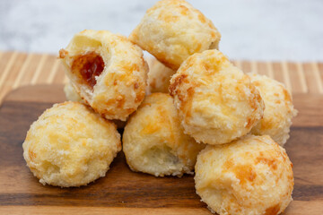 Delicious Brazilian cheese bread filled with sweet guava paste.