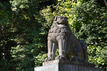 Stone sculptures of lions on the alley in Yasukuni-jinja Shrine.