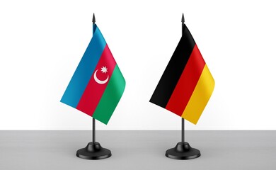 Image of the table flag of Azarbaijan and Germany countries. White background. Close-up flags. High...