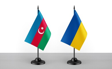Image of the table flag of Azarbaijan and Ukraine countries. White background. Close-up flags. High...