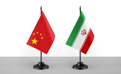 Image of the table flag of China and Iran countries. White background. Close-up flags. High...