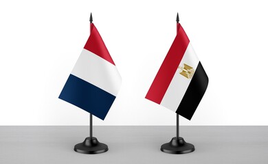 Image of the table flag of France and Egypt countries. White background. Close-up flags. High...