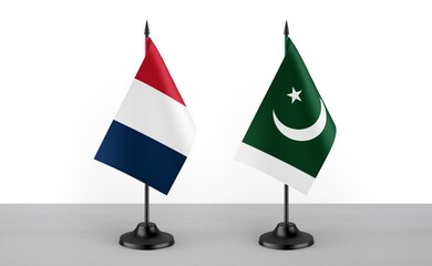 Image of the table flag of France and Pakistan countries. White background. Close-up flags. High...