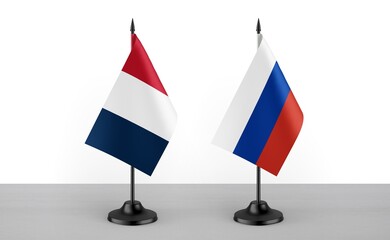 Image of the table flag of France and Russia countries. White background. Close-up flags. High...