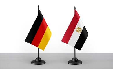 Image of the table flag of Germany and Egypt countries. White background. Close-up flags. High...