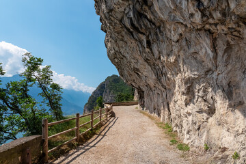 Hiking and cyclist trail Sentiero del Ponale with scenic view of Garda Lake, Trentino, Northern...