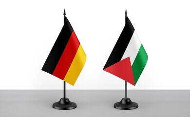 Image of the table flag of Germany and Palestine countries. White background. Close-up flags. High...