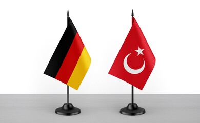 Image of the table flag of Germany and Turkey countries. White background. Close-up flags. High...