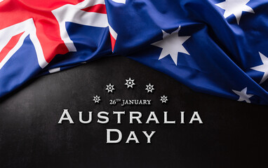 Happy Australia day concept. Australian flag against dark stone background. 26 January. © Siam