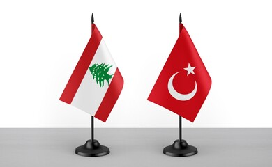 Image of the table flag of Lebanon and Turkey countries. White background. Close-up flags. High...