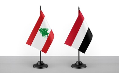 Image of the table flag of Lebanon and Yemen countries. White background. Close-up flags. High...