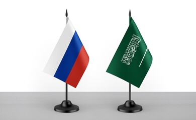 Image of the table flag of Russia and Saudi Arabia countries. White background. Close-up flags....