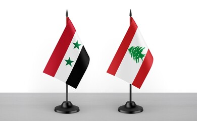 Image of the table flag of Syria and Lebanon countries. White background. Close-up flags. High...