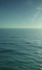 Obraz premium A gradient background with shades of green and blue that evoke the feeling of a peaceful ocean, serene surroundings, soothing atmosphere
